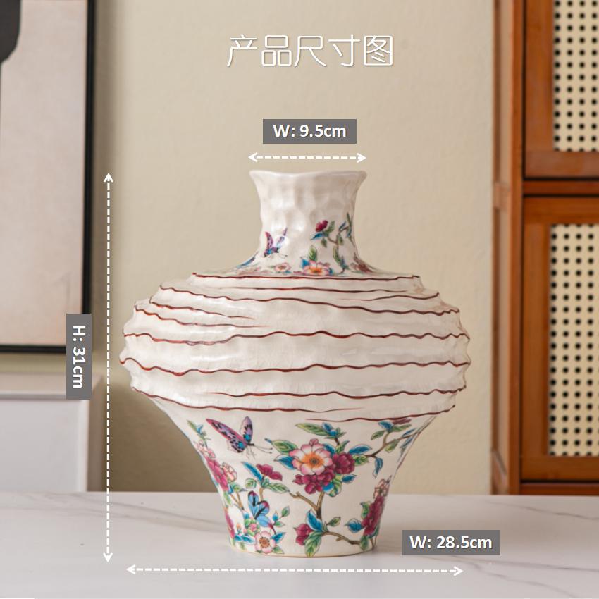 Butterfly and floral ruffled ceramic vase, 31 cm high and 28.5 cm wide