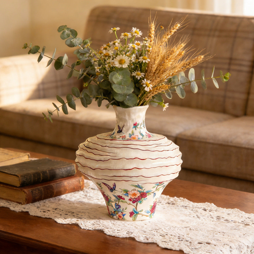 Ruffled Chinoiserie ceramic vase styled with dry flowers and eucalyptus
