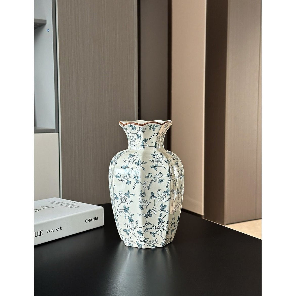 Indigo Branches scalloped ceramic vase styled on a dark console