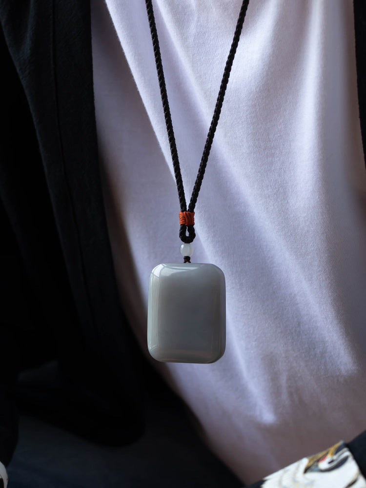 Large smoky purple Hetian jade peace plaque pendant hand-held view