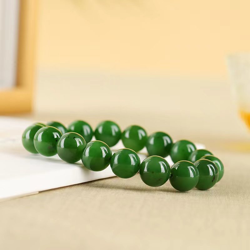 12mm spinach green nephrite jade bracelet glossy round beads close-up
