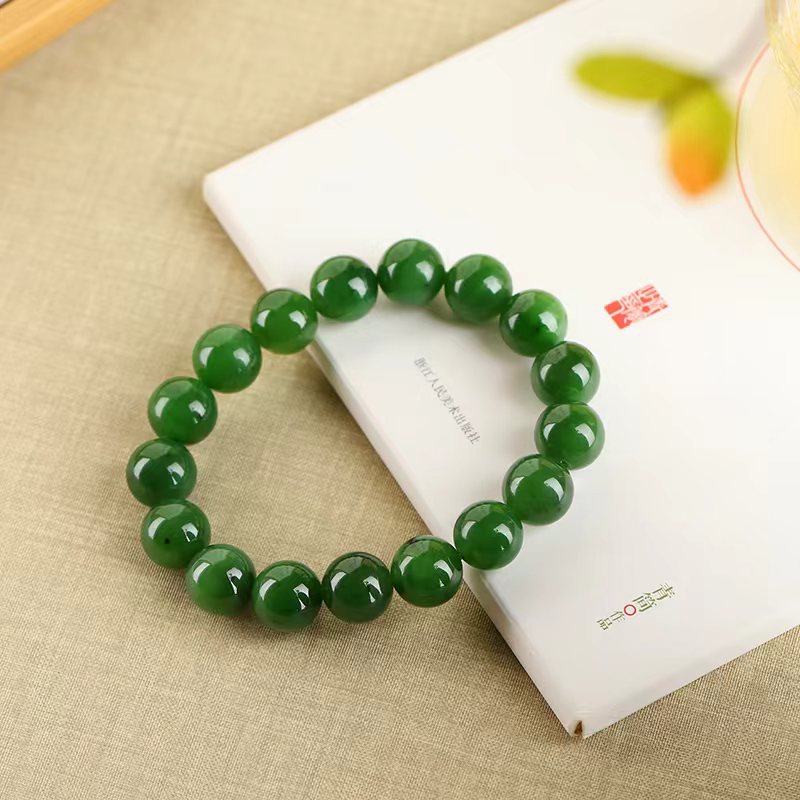 Natural Xinjiang Biyu jade bracelet deep spinach green polished bead strand