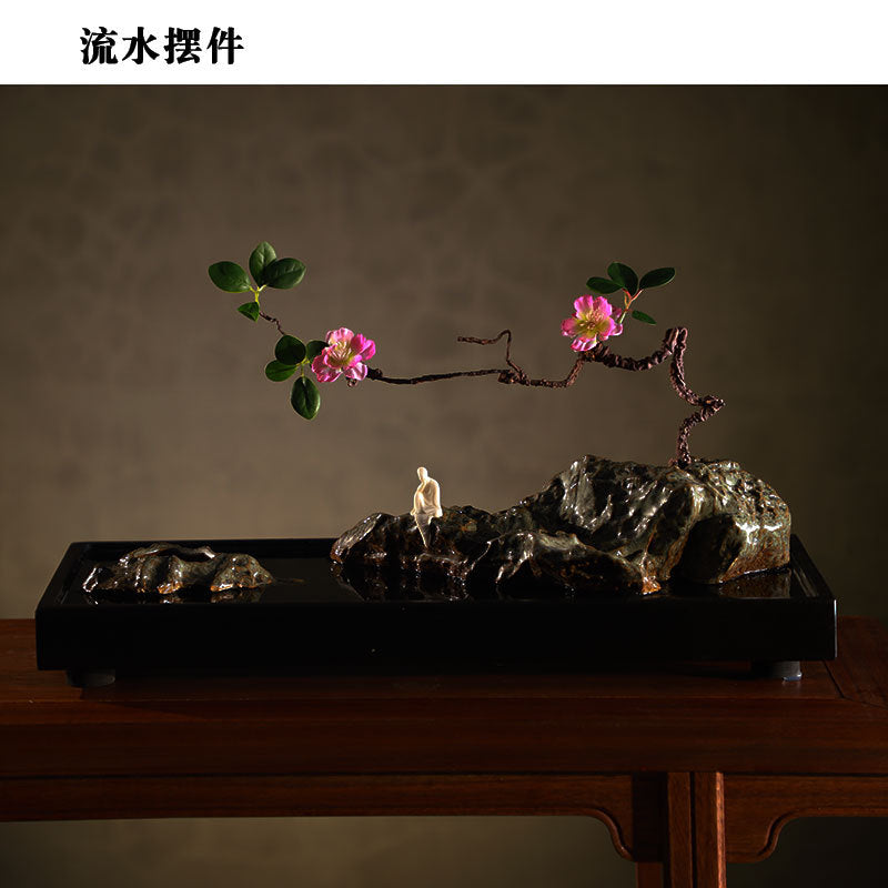 Spring Eye tabletop flowing water rockscape with flowering branch