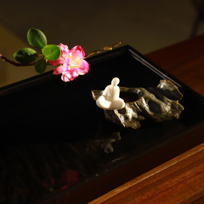 Spring Eye tabletop water feature figurine and floral branch detail