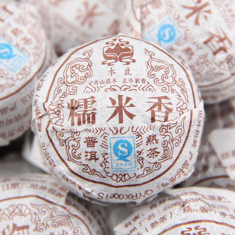 Front wrapper of Yunnan sticky rice aroma ripe Pu-erh mini tuocha tea