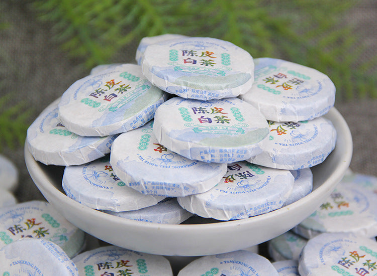 Tangerine peel white tea mini cake wrapper detail