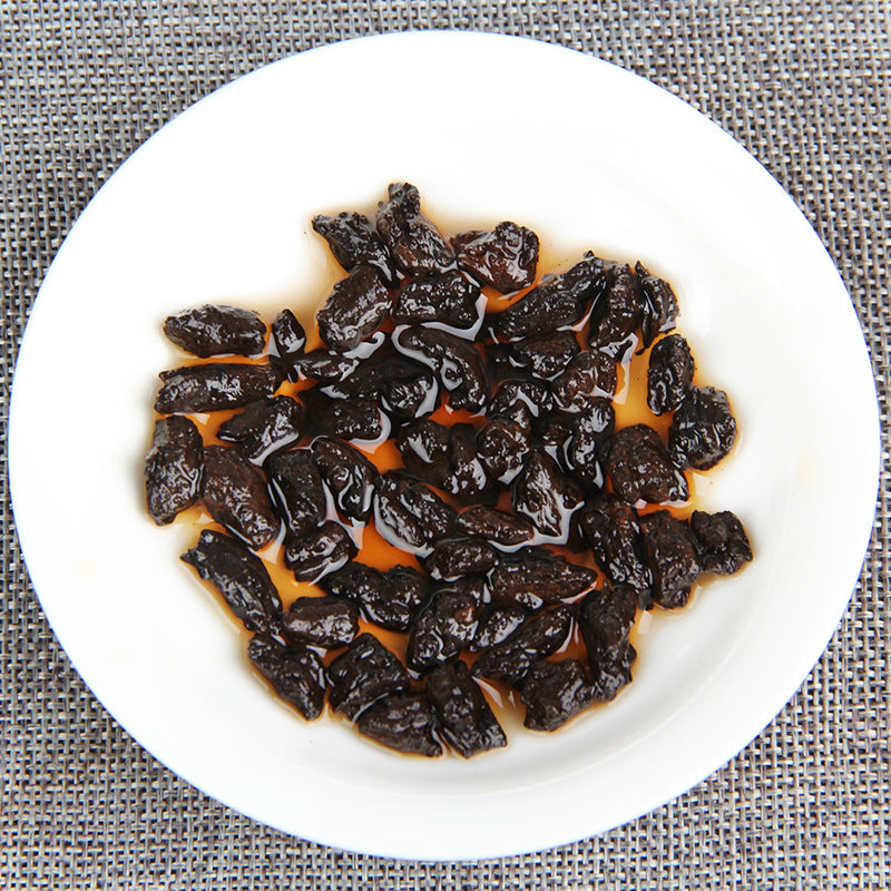 Brewed Tea Fossil Sui Yin Zi ripe Pu-erh leaves after infusion