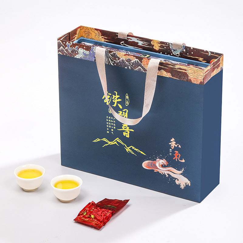 Brewed Tie Guan Yin golden tea liquor and gift box