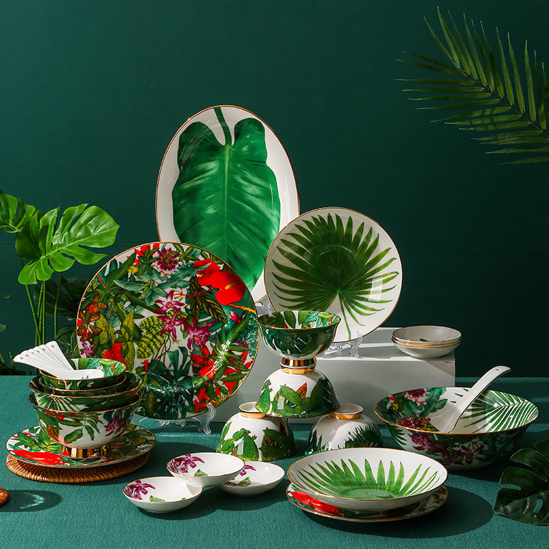 Luxury tropical rainforest bone china tablescape in deep green interior