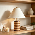 Walnut and beech striped cylindrical table lamp with cream fabric shade