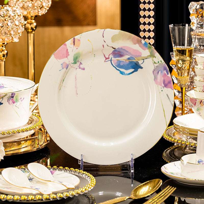 Watercolor floral bone china dinnerware lifestyle display with gold trim