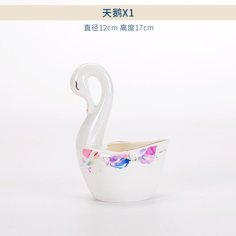 Watercolor floral bone china swan-shaped serving piece with gold trim