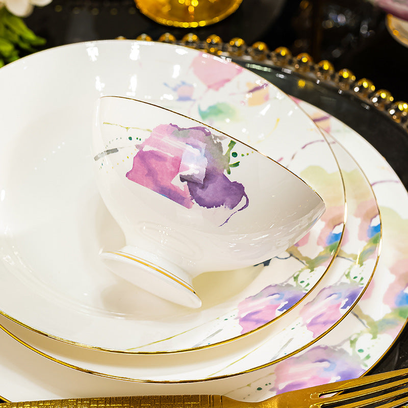 Watercolor floral bone china bowl and plate place setting close-up