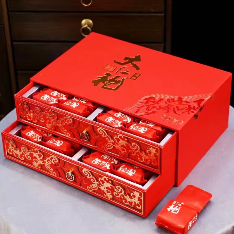 Wuyi rock oolong tea leaves and red gift presentation