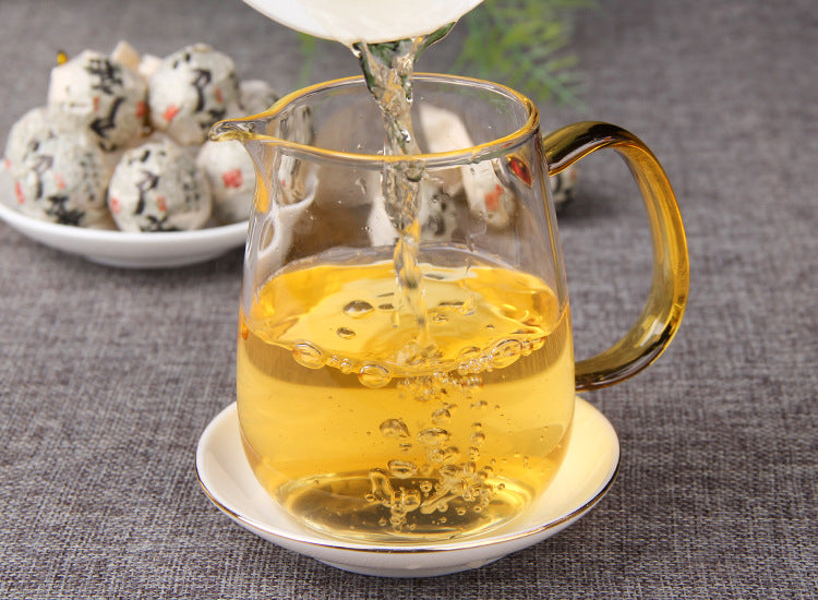 Xiaohusai raw Pu-erh dragon pearl wrapper and tea