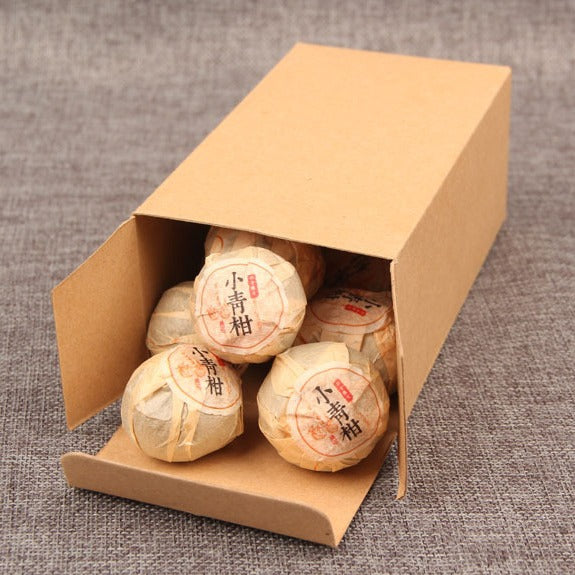 Xiao Qing Gan whole green mandarin stuffed with ripe Pu-erh