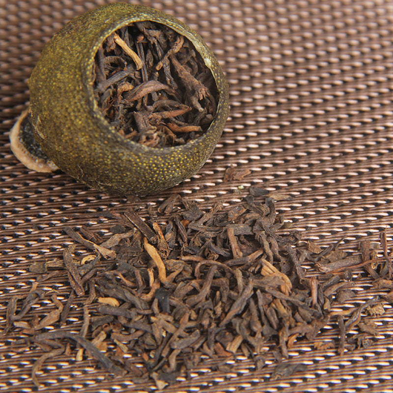 Xinhui Xiaoqinggan citrus shell and loose Gongting ripe Pu-erh tea leaf detail