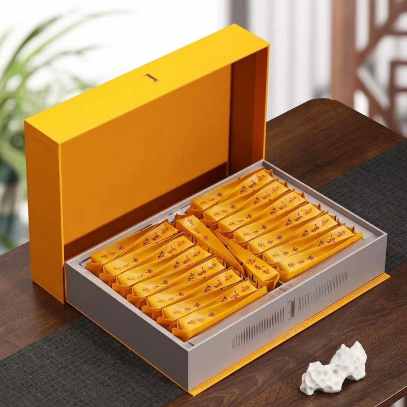 Individually packed Ya Shi Xiang tea portions in gift box