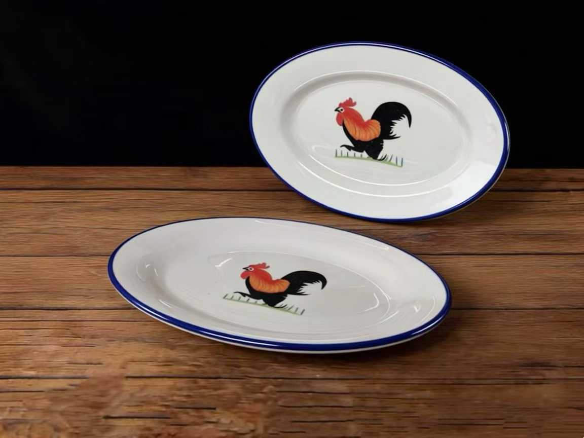 Yubaofang rooster motif oval ceramic serving plates with blue rim